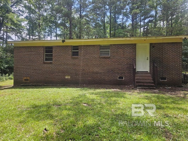 19930 Shepard Lake Rd, Mount Vernon, AL 36560 - back of property with crawl space, entry steps, and a lawn