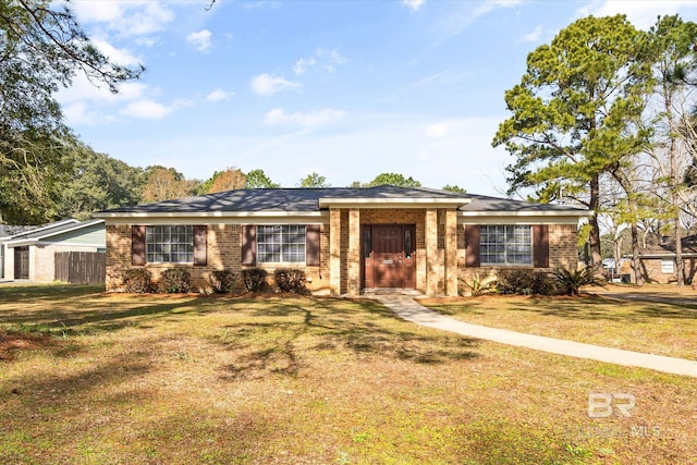 single story home with a front yard