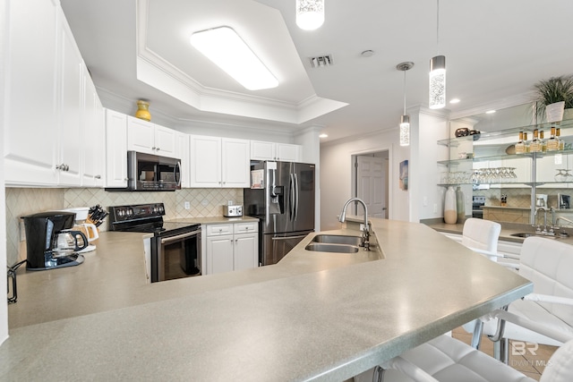 kitchen featuring a sink, decorative backsplash, ornamental molding, and stainless steel appliances