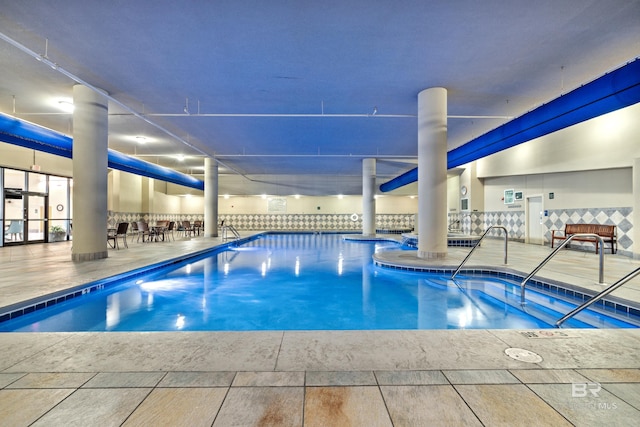 pool featuring a patio area