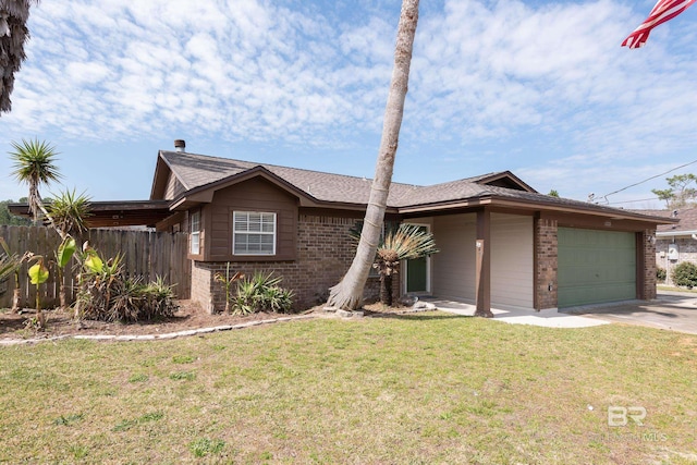 view of front facade featuring a garage, brick siding, fence, driveway, and a front yard