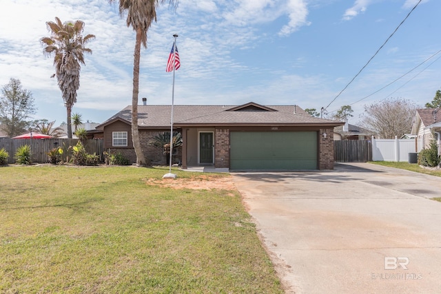 view of front of home with a garage, driveway, brick siding, and a front lawn