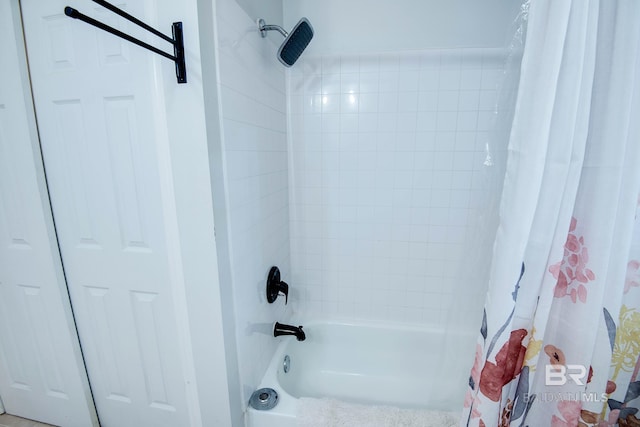 bathroom with shower / bath combination with curtain