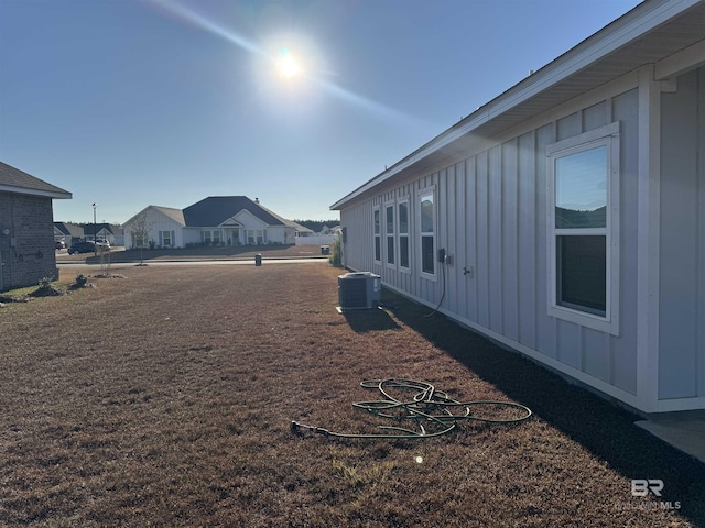 view of yard featuring central AC unit