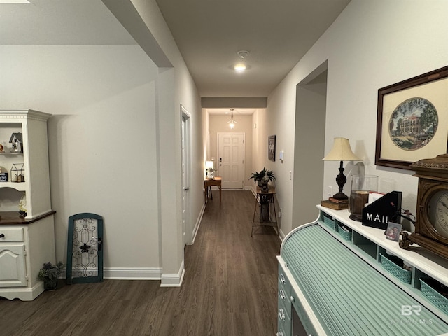 hallway featuring dark wood-type flooring