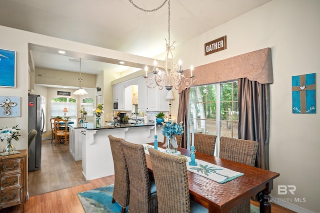 11346 County Road 99, Lillian, AL 36549 - dining room featuring a chandelier, light wood-style floors, healthy amount of natural light, and recessed lighting