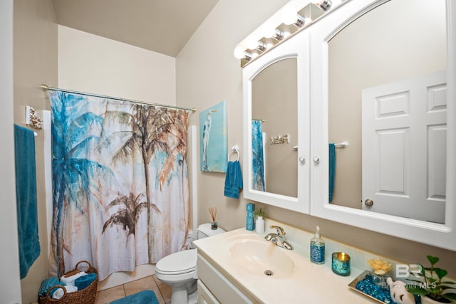 11346 County Road 99, Lillian, AL 36549 - bathroom with vanity, toilet, tile patterned floors, and a shower with shower curtain
