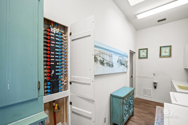 11346 County Road 99, Lillian, AL 36549 - wine area featuring wood finished floors and baseboards