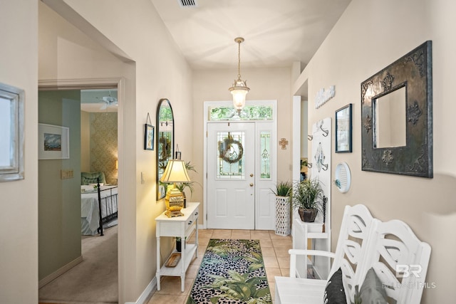11346 County Road 99, Lillian, AL 36549 - entrance foyer featuring light tile patterned floors and baseboards