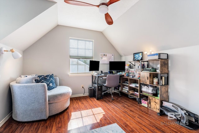 office featuring ceiling fan, wood-type flooring, and vaulted ceiling