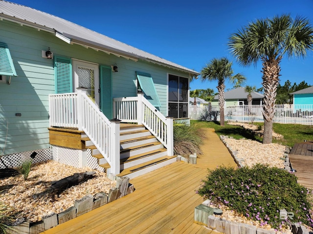 deck with a sunroom