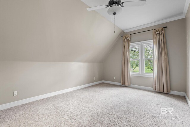 additional living space featuring carpet, lofted ceiling, and ceiling fan