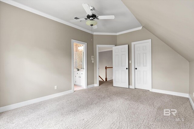 additional living space with ceiling fan, vaulted ceiling, and carpet flooring