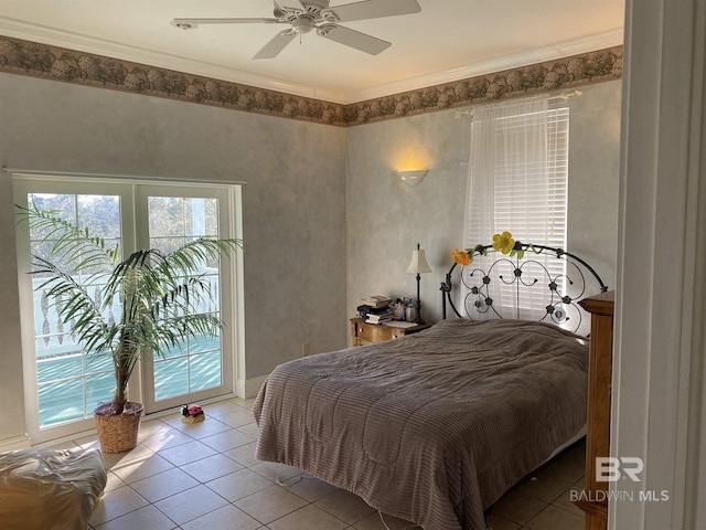 bedroom featuring tile flooring, ceiling fan, and access to outside