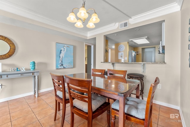 dining room featuring light tile patterned floors, crown molding, visible vents, baseboards, and an inviting chandelier
