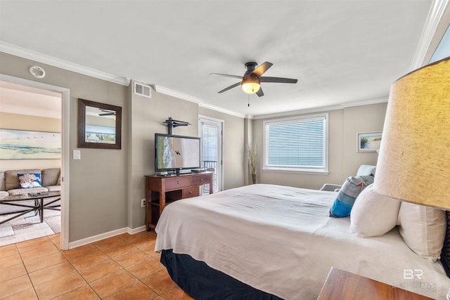 bedroom featuring light tile patterned floors, crown molding, visible vents, and baseboards