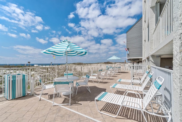 view of patio / terrace featuring a water view