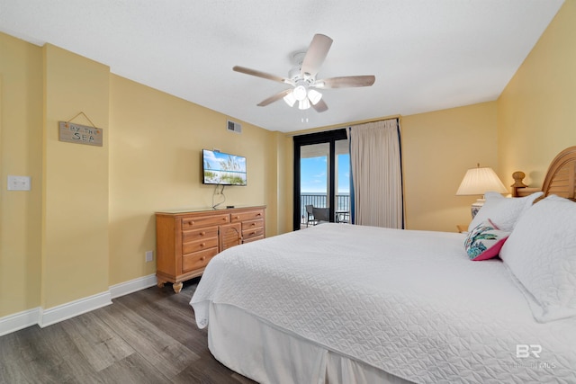 bedroom with wood finished floors, a ceiling fan, visible vents, baseboards, and access to outside