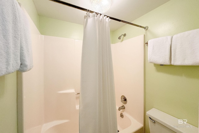 full bath with toilet and shower / tub combo