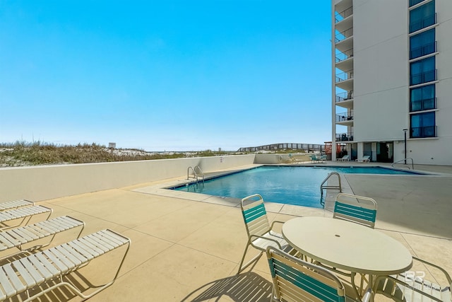 pool with a patio