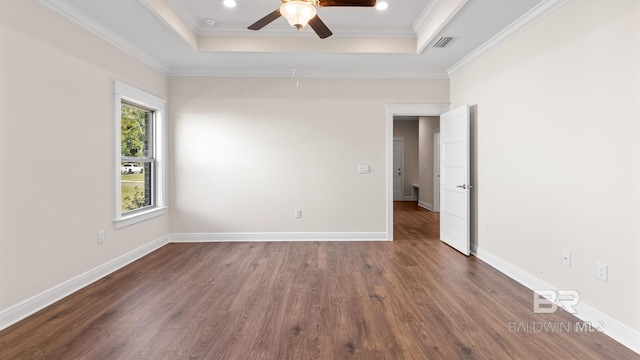 10253 Secretariat Blvd, Daphne, AL 36526 - unfurnished room with a raised ceiling, dark wood-style floors, ceiling fan, ornamental molding, and baseboards