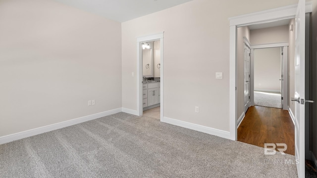 10253 Secretariat Blvd, Daphne, AL 36526 - unfurnished bedroom with carpet floors, baseboards, and ensuite bathroom