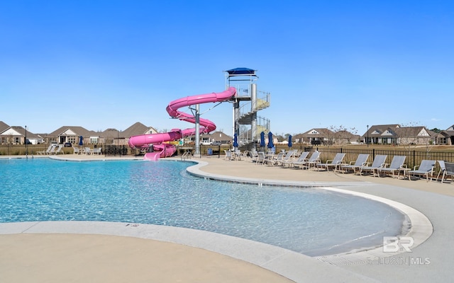 10253 Secretariat Blvd, Daphne, AL 36526 - community pool with a water slide, a patio area, and a residential view