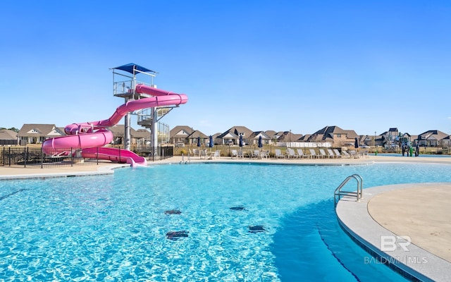 10253 Secretariat Blvd, Daphne, AL 36526 - community pool with a water slide and a residential view