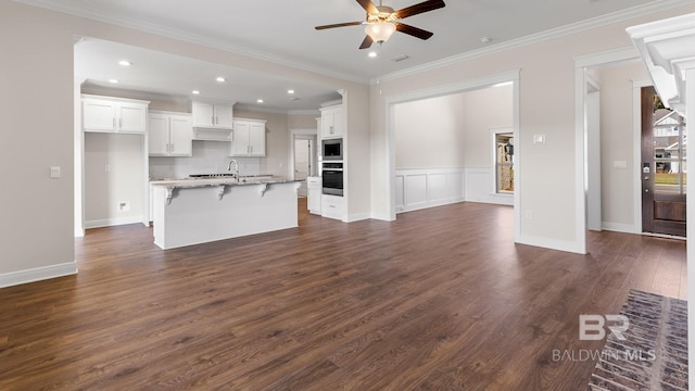 10253 Secretariat Blvd, Daphne, AL 36526 - kitchen featuring stainless steel appliances, ceiling fan, a sink, white cabinetry, and dark wood-style floors