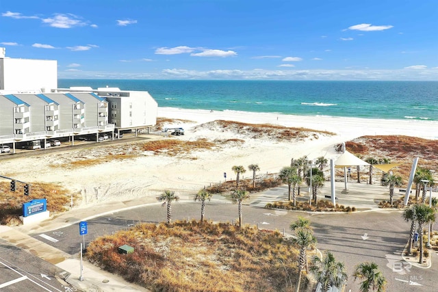 view of water feature featuring a view of the beach and a gazebo