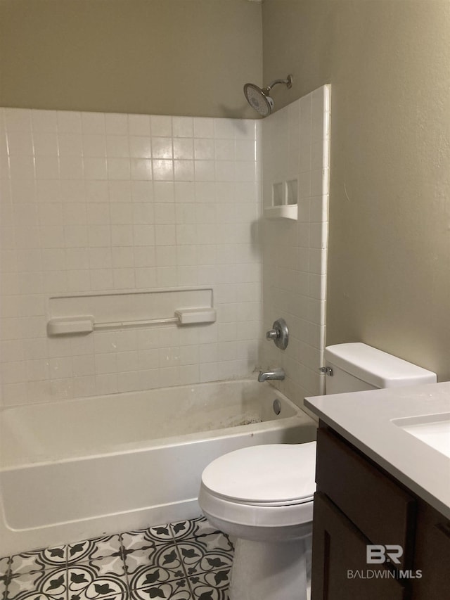 full bath with vanity, tile patterned flooring, shower / tub combination, and toilet