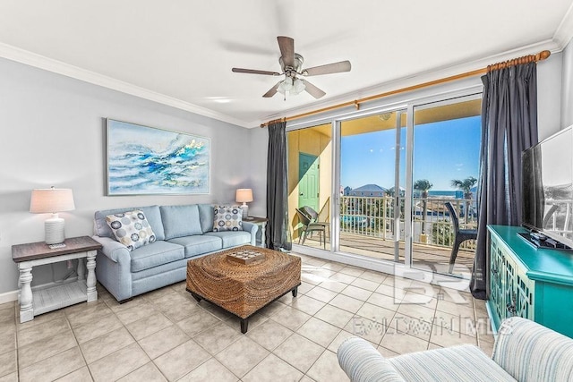 living area with light tile patterned floors, ceiling fan, and crown molding