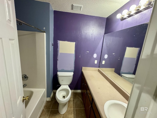 43265 Jones Rd, Bay Minette, AL 36507 - bathroom featuring vanity, tile patterned flooring, a textured ceiling, and shower / bath combination