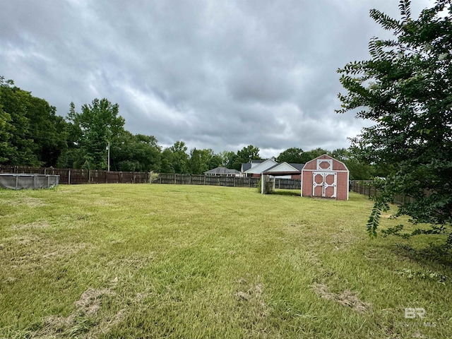 43265 Jones Rd, Bay Minette, AL 36507 - fenced backyard featuring a storage unit