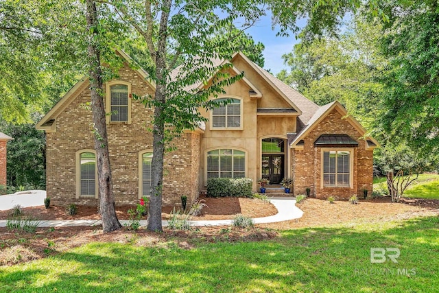 30230 Dolive Rdg, Daphne, AL 36527 - traditional-style home featuring a front lawn and brick siding