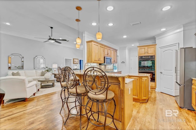 30230 Dolive Rdg, Daphne, AL 36527 - kitchen featuring stainless steel appliances, ornamental molding, a peninsula, open floor plan, and ceiling fan