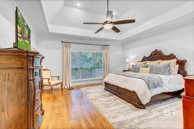 30230 Dolive Rdg, Daphne, AL 36527 - bedroom with a tray ceiling, light wood finished floors, crown molding, ceiling fan, and recessed lighting