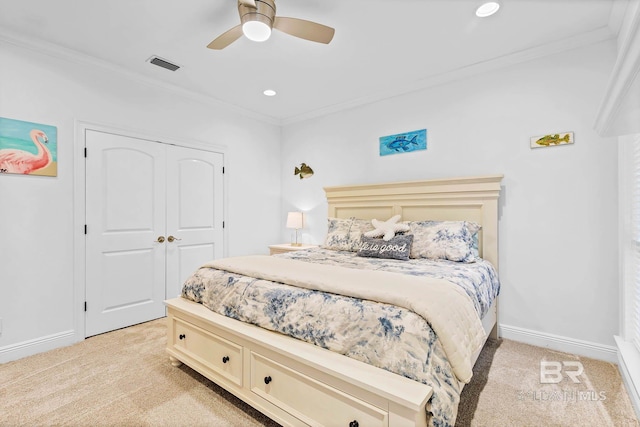 30230 Dolive Rdg, Daphne, AL 36527 - bedroom with light carpet, crown molding, a closet, a ceiling fan, and recessed lighting