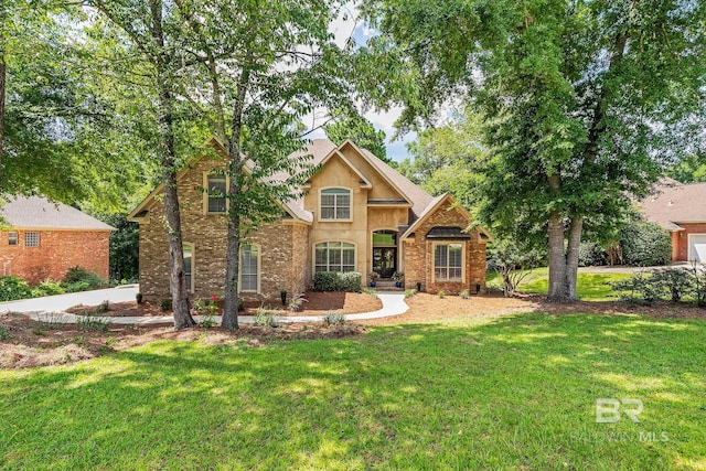 30230 Dolive Rdg, Daphne, AL 36527 - traditional-style home featuring a front lawn and stucco siding
