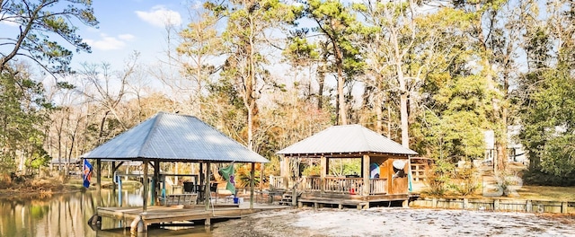 dock area with a water view and a gazebo