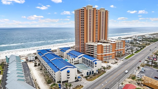 bird's eye view featuring a beach view and a water view