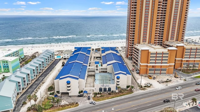 drone / aerial view with a view of the beach and a water view