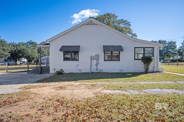 25121 State St, Elberta, AL 36530 - view of property exterior with a yard