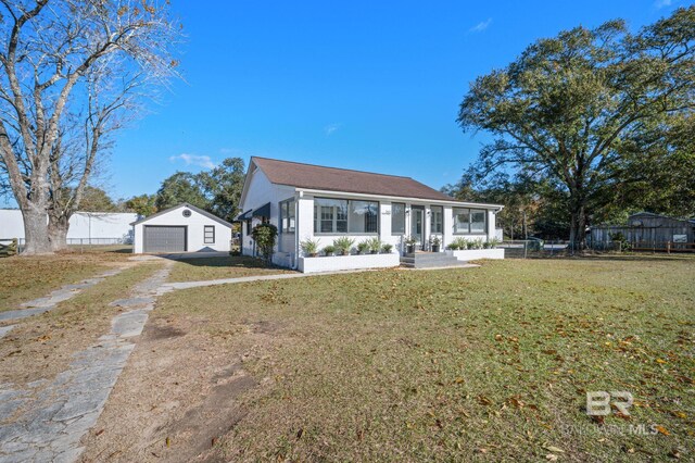 25121 State St, Elberta, AL 36530 - ranch-style house with a garage, a front lawn, and an outdoor structure