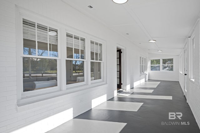 view of unfurnished sunroom