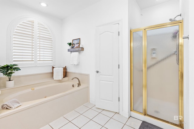 full bath featuring recessed lighting, a garden tub, a shower stall, and tile patterned floors