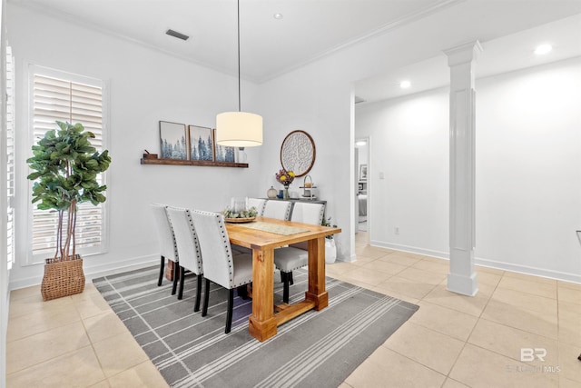 tiled dining space with baseboards, ornamental molding, visible vents, and ornate columns