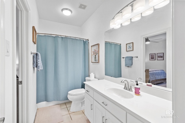 full bathroom featuring toilet, a shower with shower curtain, visible vents, vanity, and tile patterned floors