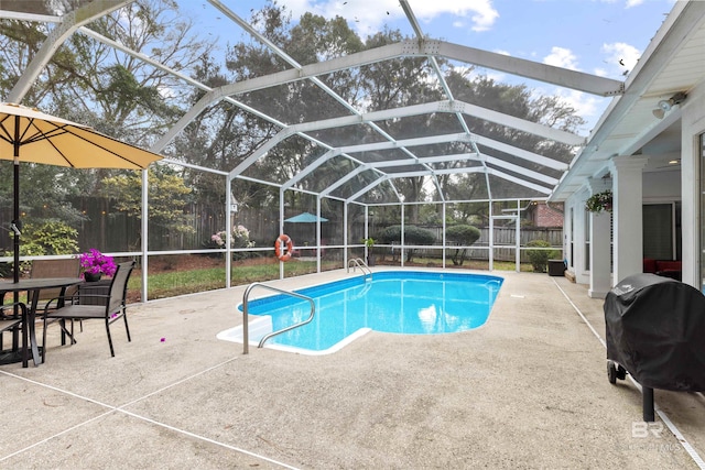 view of swimming pool featuring a fenced in pool, a patio, a grill, a lanai, and a fenced backyard