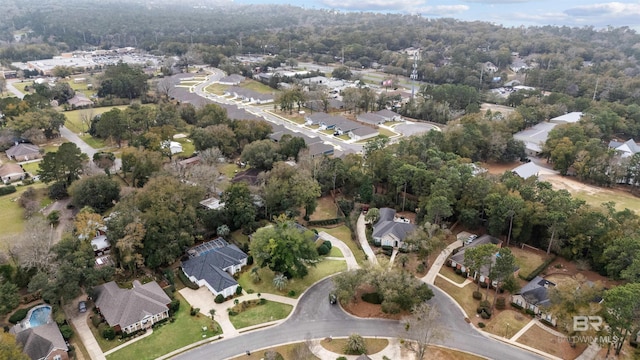 birds eye view of property with a residential view